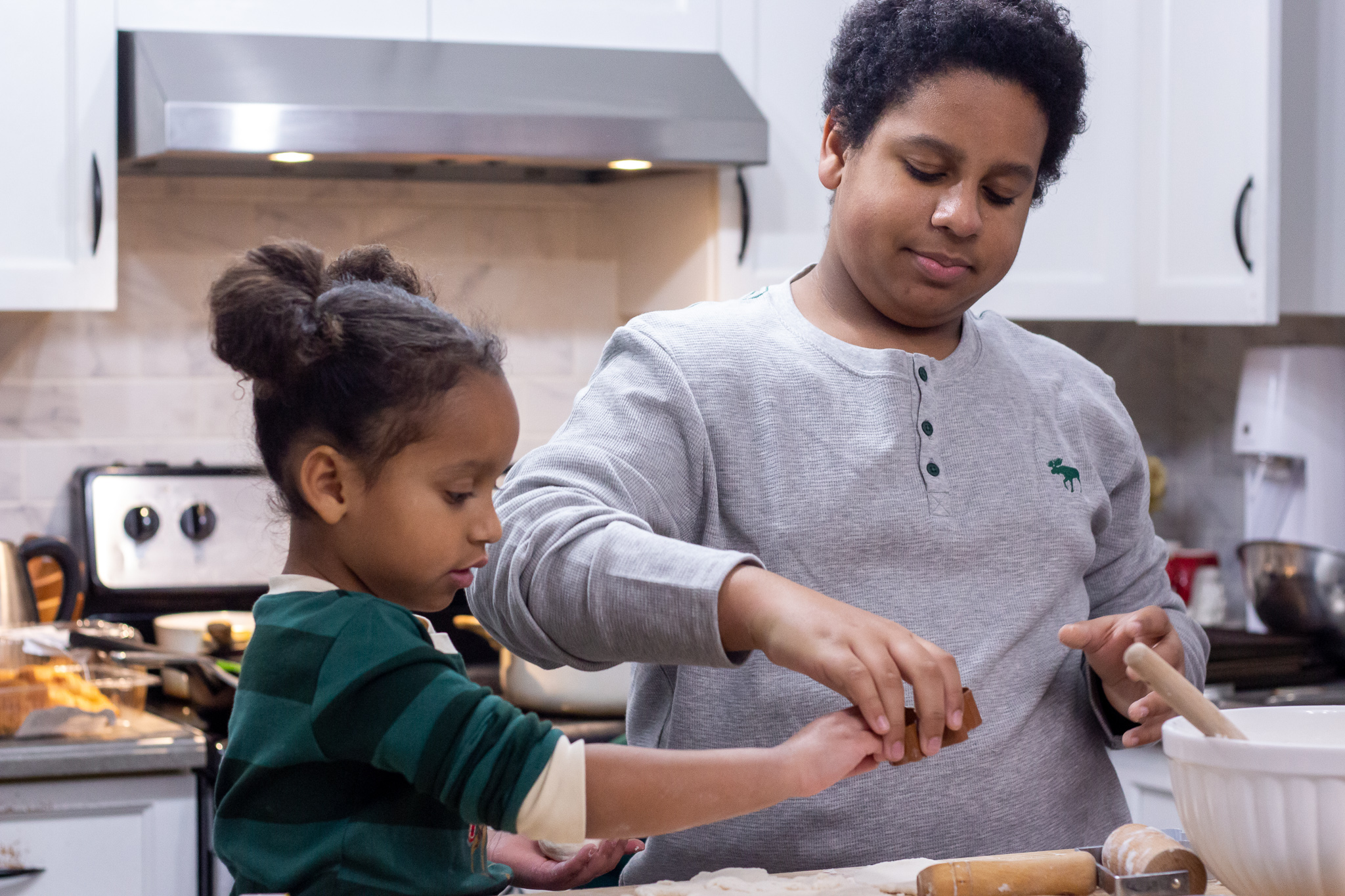 Kids making Christmas ornaments using salt dough