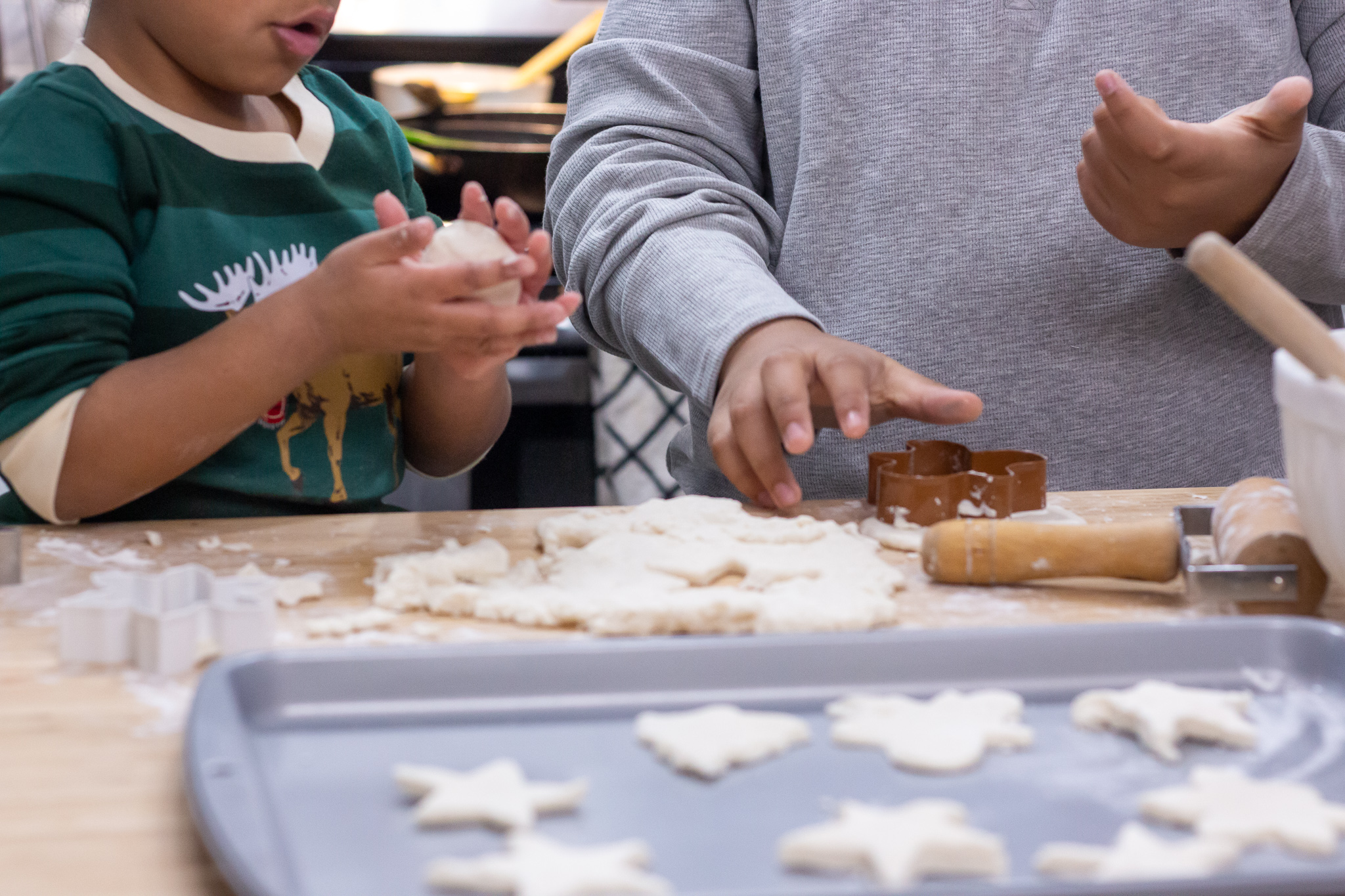 Kids making Christmas ornaments using salt dough