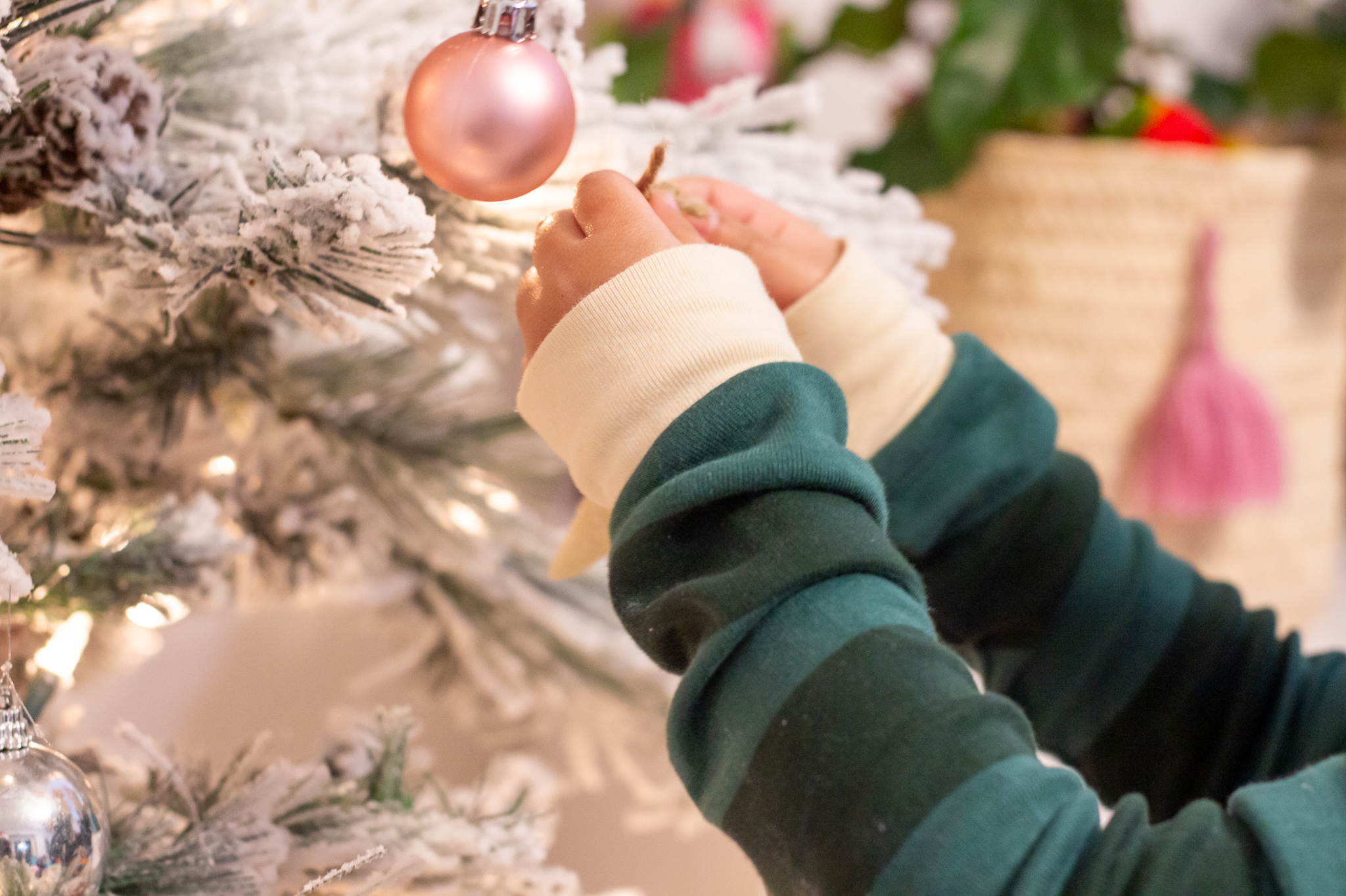 Girl hold Christmas ornament made out of salt dough