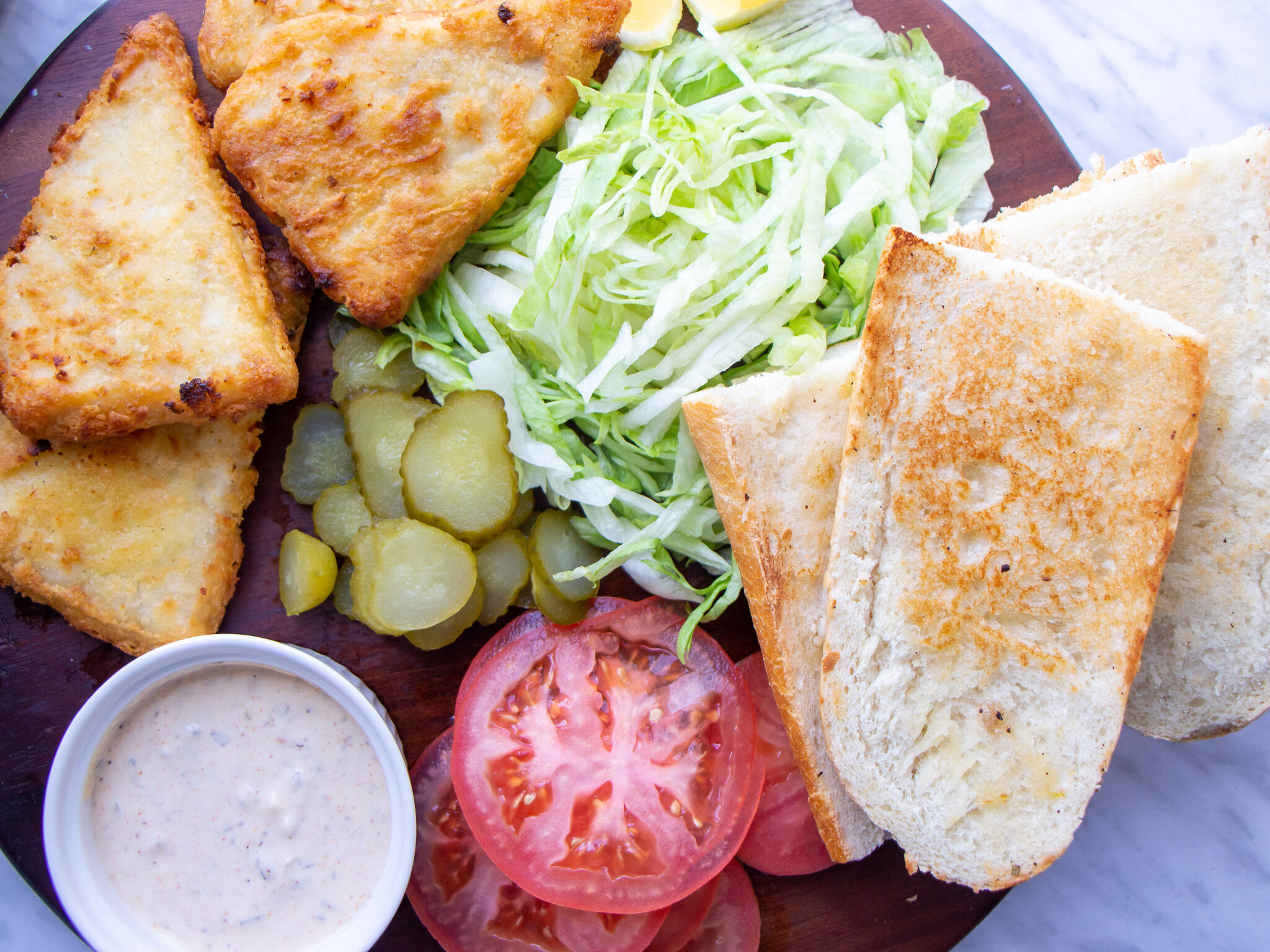 High Liner's Signature Cuts® English Style Battered Haddock Fillets Po’ Boy Sandwich with Cajun Sauce
